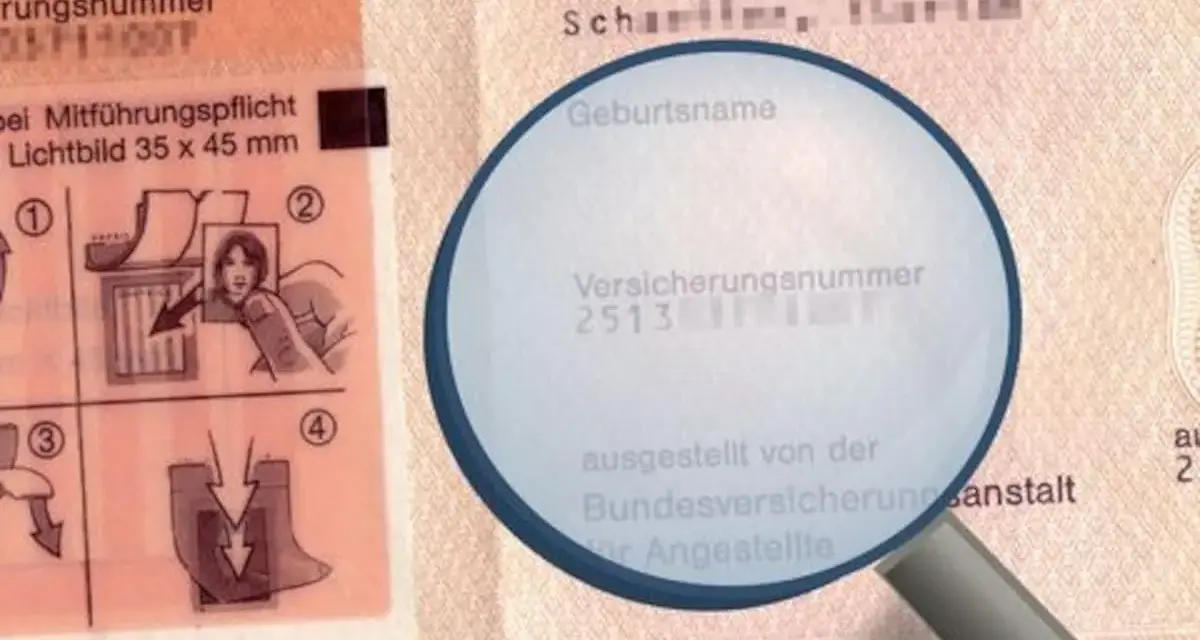 Lupe zeigt auf Sozialversicherungsnummer auf einem Dokument. Hier erfährst du, wo du deine Sozialversicherungsnummer findest.