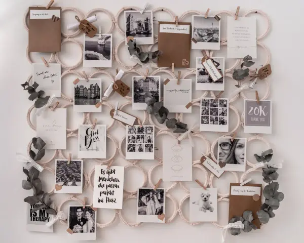 Ein Visionboard mit inspirierenden Bildern und Zitaten wie "Girl Boss" und "grow".
